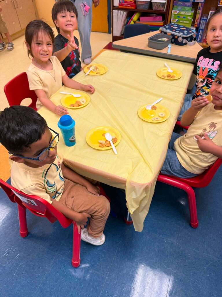 kids eating yellow food