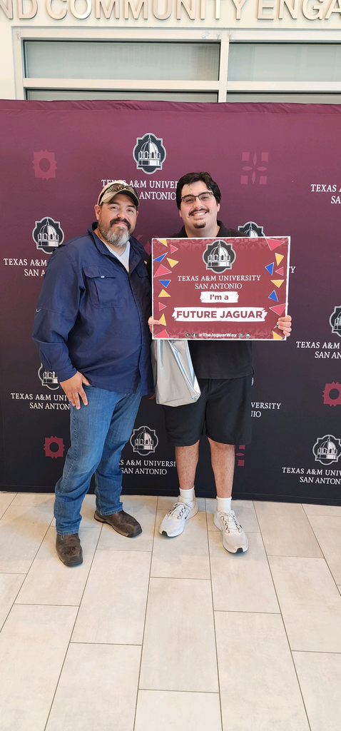 men holding poster