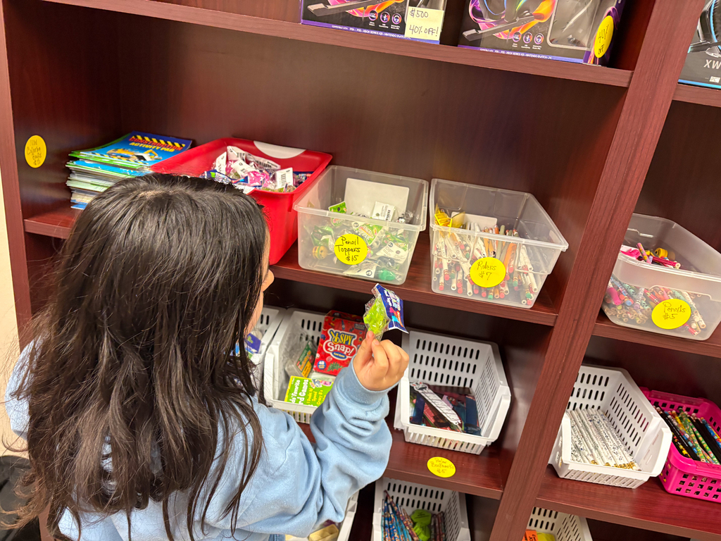 girl picking out something
