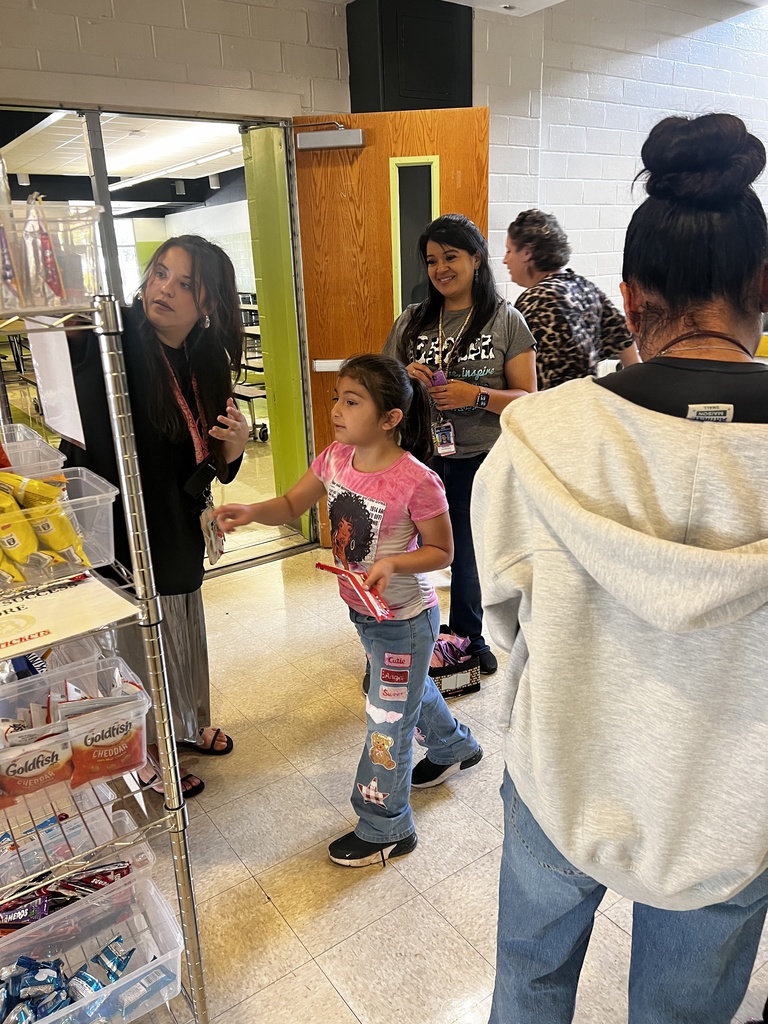 girl choosing something from school store