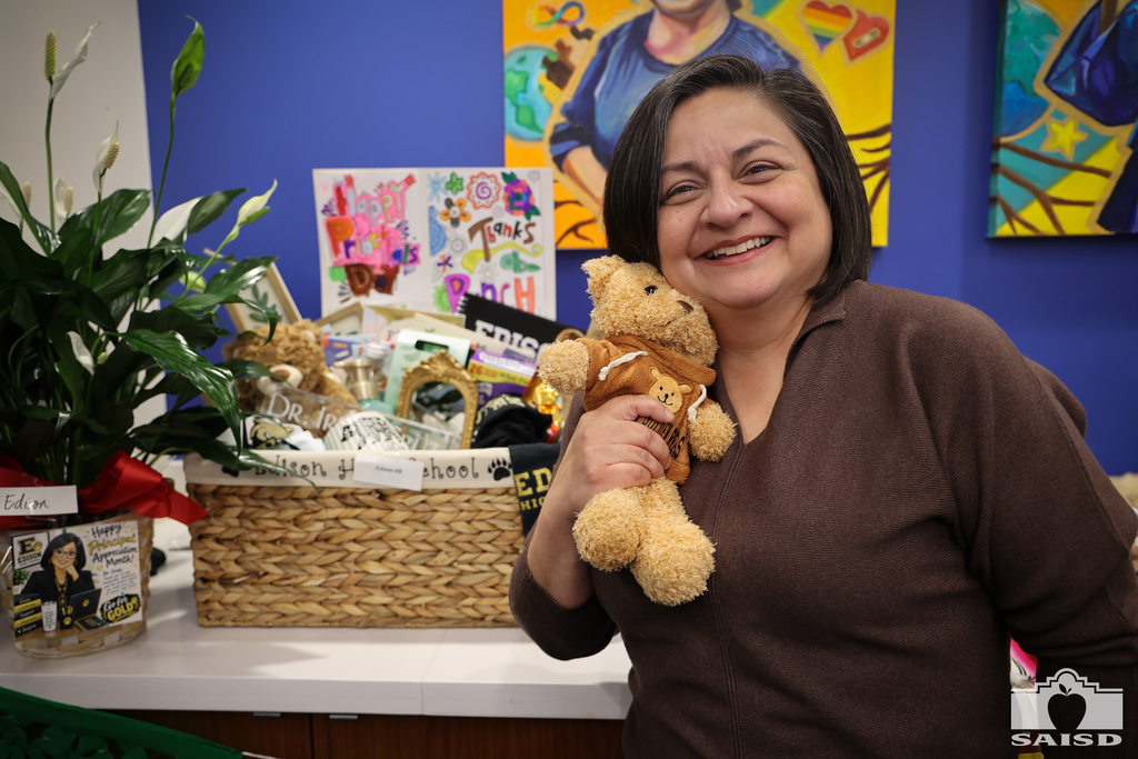 Edison principal with gift basket and bear 