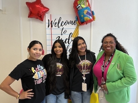 Two third grade teachers and two emerging educators