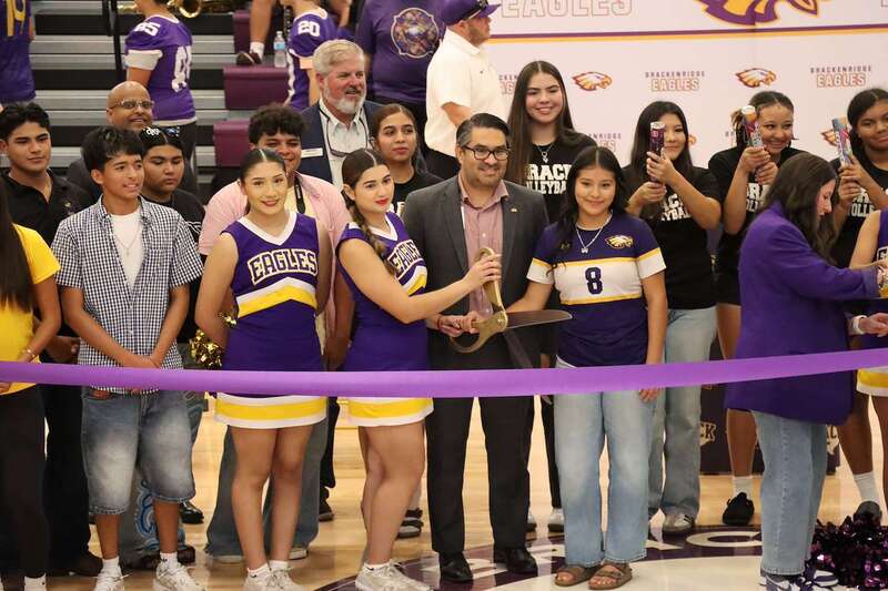 Students and Dr. Bustillos at ribbon cutting