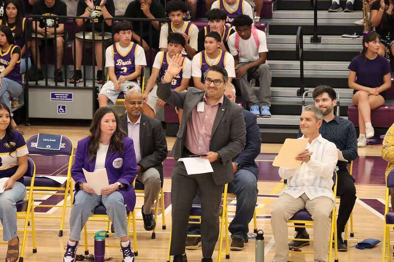 Dr. Bustillos waves to crowd