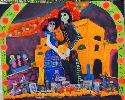 Poe table altar with dancing cantrines