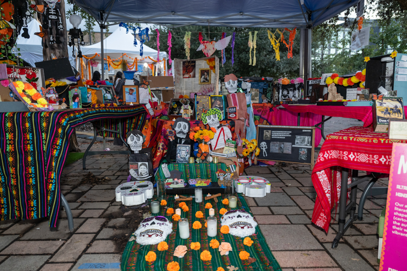 Fox Tech Large altar with marigolds, calaveras and photos