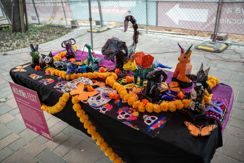 Bonham table altar with alebrijes