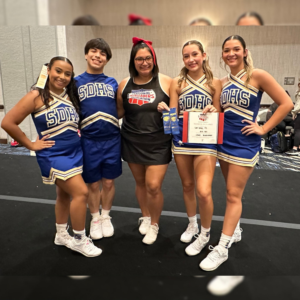 SDHS Cheer cheerleaders with their NCA Staff coach.