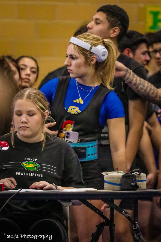 KC Mednez waits her turn to lift