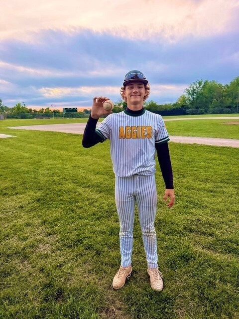 Senior, Andon Sutherland, with his grand slam ball
