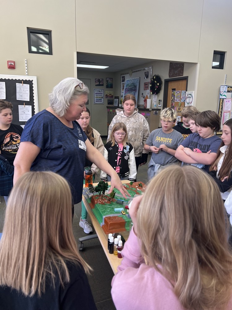 kids standing with instructor