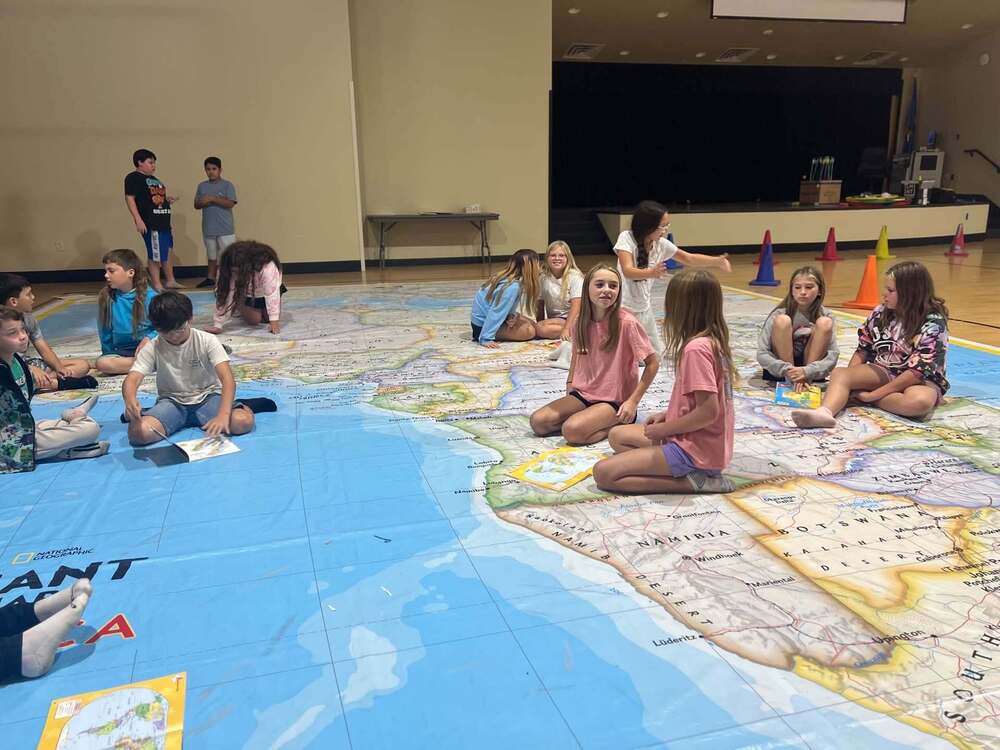 children on giant map