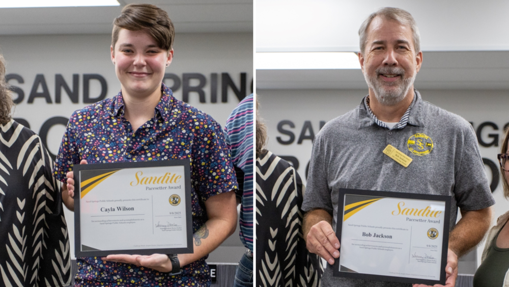 Cayla Wilson and Bob Jackson holding their Sandite Pacesetter Awards