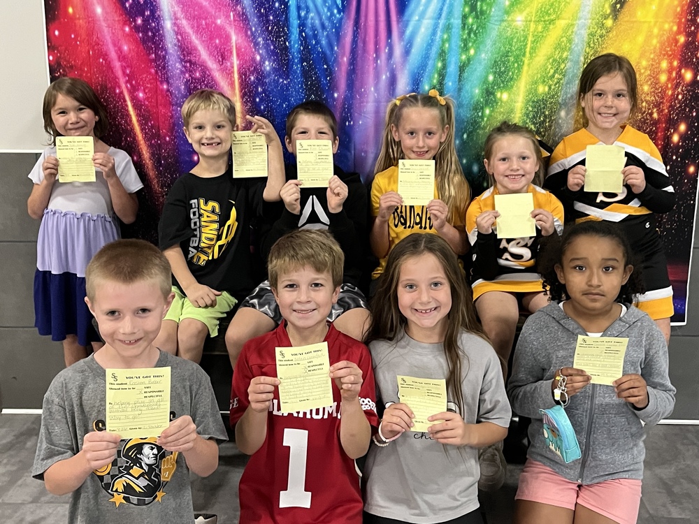 Angus Valley students hold up their "You've Got This" slips.