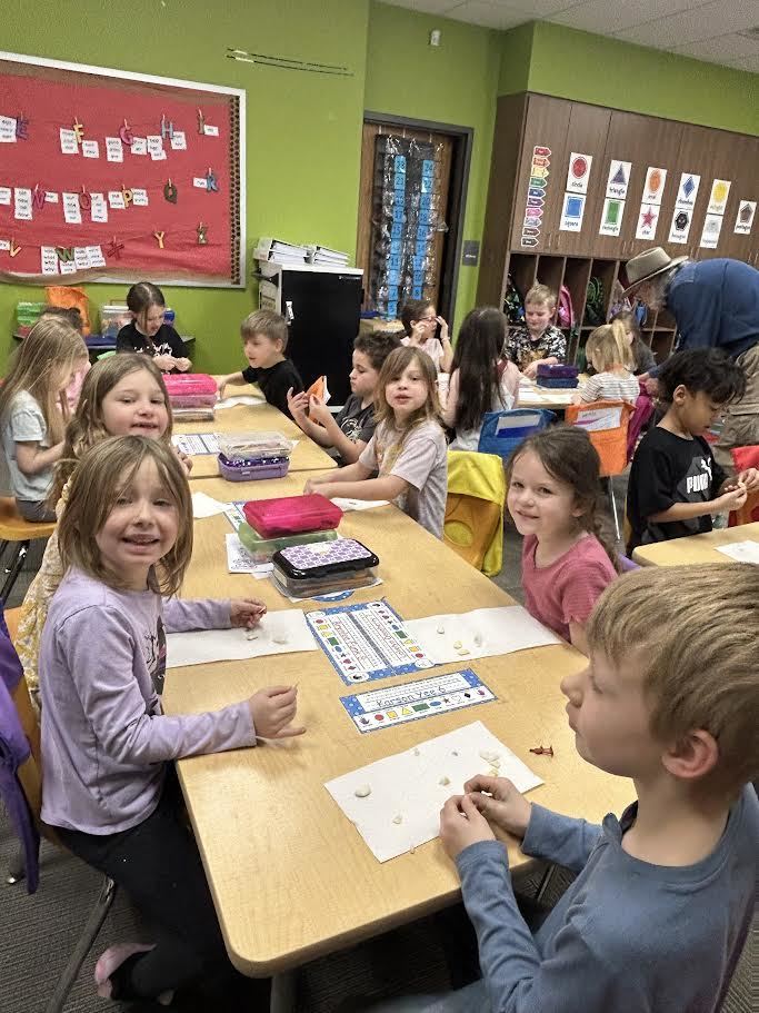 Master Gardener's teaching 1st graders about seeds