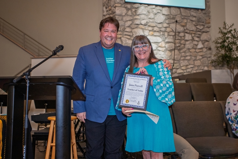 Brian Jackson presents Jana Purcell with the Masonic Fraternity of Oklahoma Teacher of Today Award.