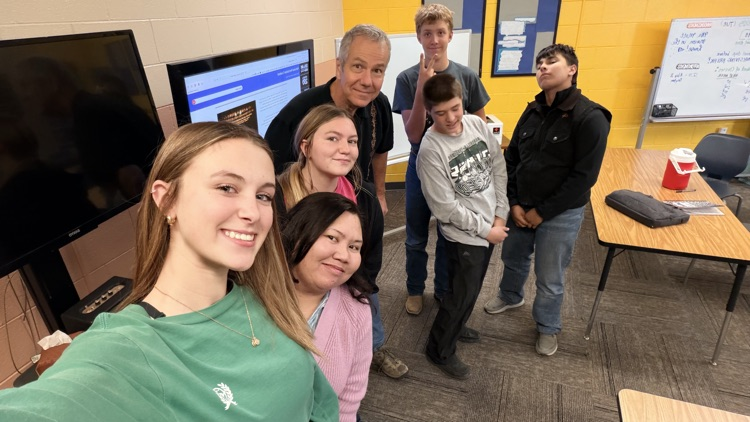 with Mrs. Bernardo and the state poet