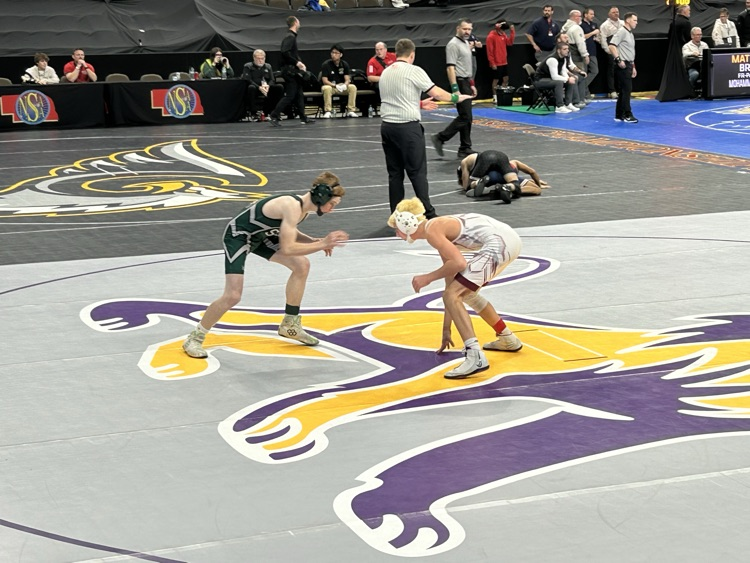 Caleb state meet second match.