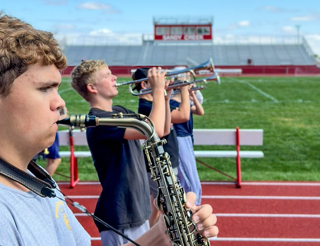 Ashton Shuck and Owen Spray perfecting their horn angles as they prepare for Harvest of Harmony