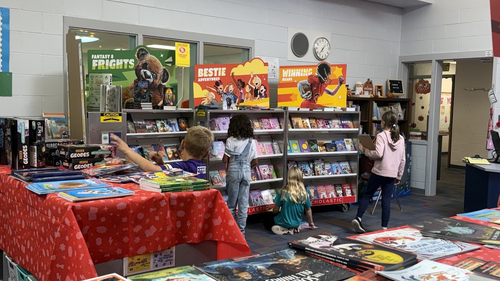 Student shopping at the Scholastic Book Fair