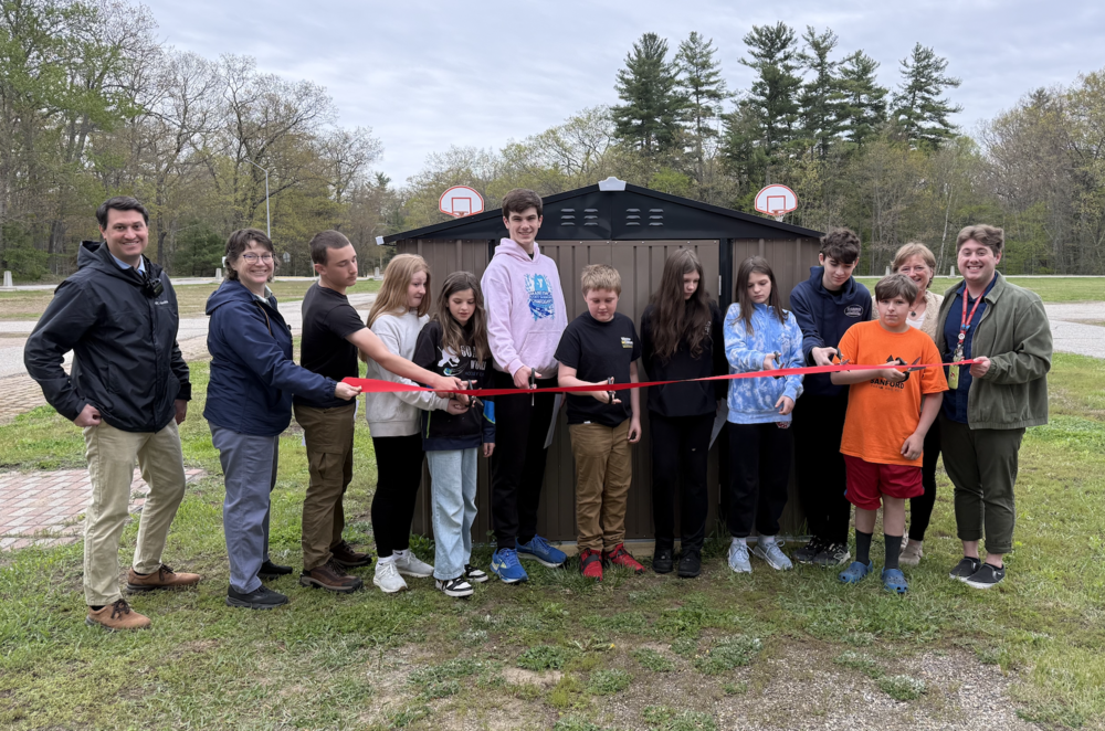 Sanford Middle School marked a major milestone this week with the ribbon cutting of a brand-new outdoor equipment shed, one that students designed and constructed themselves. Members of the school's Mechanical Advantage Club and Environmental Club collaborated throughout the year on the project, handling everything from framing and assembly to finishing the floor just last week. The shed is now fully operational and accessible to the entire student body. The build is the latest in a long tradition of hands-on projects at Sanford Middle School, where students have tackled everything from birdhouses and woodworking to solar-powered cars and underwater remotely operated vehicles. This year's shed represents the club's most ambitious undertaking yet, a permanent structure on school grounds that students can point to with pride for years to come. The shed is stocked with outdoor equipment including cornhole boards, volleyballs, basketballs, Frisbees, soccer balls, and more. Students will have access to the space during a dedicated flex block in their daily schedule, giving them the opportunity to get outside, enjoy some fresh air and sunshine, and build stronger connections with their peers. Staff were introduced to the shed and its checkout procedures this week as well.