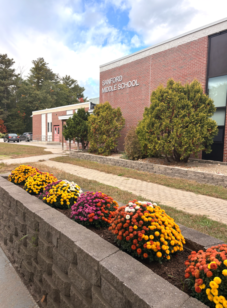 Colorful flowers grow in the flower beds in front of Sanford Middle School.