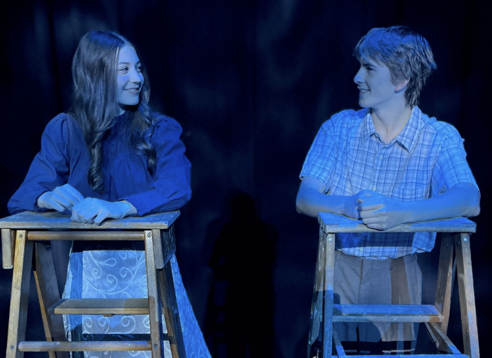 Sanford High School Theater Company presents Thornton Wilder’s timeless American classic, Our Town at Sanford Performing Arts Center. Performances will be held on Friday, November 14 at 7 pm, Saturday, November 15 at 7 pm, and Sunday, November 16 at 2 pm.  Set in the small town of Grover’s Corners, Our Town tells the universal story of everyday life, love, and loss. Through simple yet profound moments, the play invites audiences to reflect on what it means to truly appreciate the beauty in ordinary days. Wilder’s masterful storytelling continues to resonate with audiences nearly a century after its debut.  This production features a cast of 22 talented SHS students, including Braeden Landry as the omniscient Stage Manager, Anna Brown as the spirited Emily Webb, and Jack Van Gieson as the earnest George Gibbs.  “Our Town reminds us all to slow down and recognize the extraordinary in the everyday,” said director Brett Williams. “Our students have found deep meaning in this story, connecting its themes of family and friendship to their own experiences growing up in Sanford.”  Tickets are $13 for adults, $10 for seniors and active military, and free for students.  Come celebrate live theater and the remarkable work of Sanford’s young artists!