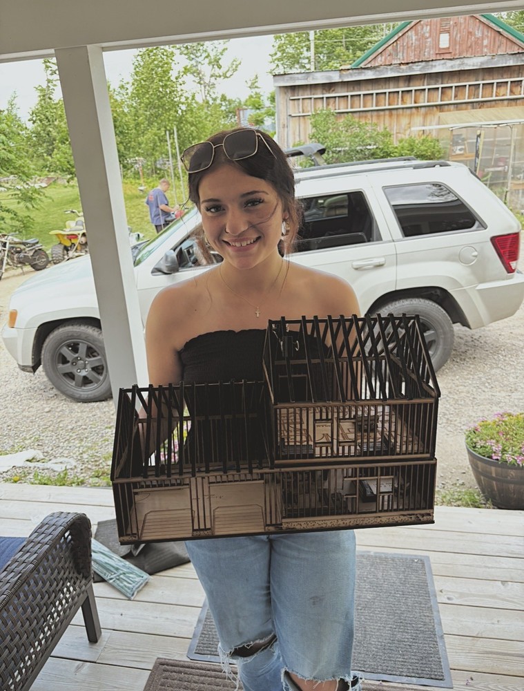 Senior Hannah Chambers, a student in Sanford Regional Technical Center's Engineering and Architecture program, is gaining hands-on experience in the construction industry through her internship at Eldredge Lumber Company—and confirming her decision to enter the workforce immediately after graduation. When Hannah attended SRTC's Career and College Fair last fall, her teacher Mr. Clark guided her to the Eldredge Lumber table. Lindsey Eldredge remembers that first meeting clearly: "She made incredible eye contact. She was dressed professionally, and she shook my hand." After receiving an application and Lindsey's business card, Hannah demonstrated remarkable persistence. "She emailed me every single month," Eldredge said. "She's extraordinary." That determination led to her landing an internship at the company's contractor desk. "I wanted to get a chance to know what my future job would be like, and also to get more experience under my belt," Chambers said. "I plan on not going to college—I'd rather go straight into the work field, and this opportunity helps me understand what my life will look like when I graduate." Three to four days each week, Hannah immerses herself in the building materials business. She's learned to navigate Eldredge Lumber’s extensive inventory, memorize product sizes and account names, and help contractors place orders efficiently. "It's always a learning experience, also a memory game," she shares. "There are many questions about what sizes we stock and where certain things are throughout the store." Her background has proven valuable. "She's incredible with customers," Eldredge said. "She has a really great, gregarious personality, and her dad is a builder, so she knows our clientele and understands the language." Through the internship, Hannah has developed a deeper understanding of lumber dimensions, wood species, and material applications. "I like learning things with the customers," she said. "Going through orders and learning why they ordered this and what they are using the specific material for." The experience has solidified her career path. Rather than pursuing a college degree to become an architect, she's set her sights on becoming a draftsman. "This internship has helped me know that even if I am not going to college, I can still make it, doing what I love," she said. Her immediate goal? "I hope after this year is over I can get hired here at Eldredge when my internship is over." For Eldredge, students like Hannah represent valuable future employees. "The SRTC students are not entry-level employees," she explains. "They already have the knowledge. It's an easy transition to get these kids from SRTC into the workforce." Eldredge Lumber offers comprehensive benefits and long-term career potential. "If college isn't the way these kids want to go, I can offer them a career, not just a job," Lindsey says. Hannah's internship is one of several Extended Learning Opportunities coordinated by Sally MacDougal, offering students pathways to explore career options and build industry connections—whether they're headed to college or directly into the workforce.