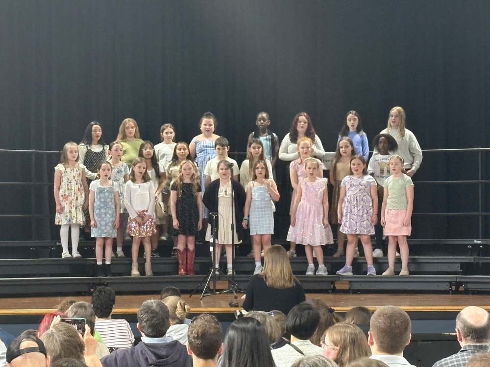 Sanford Pride Elementary wrapped up the week before April vacation with its Celebration of Learning, a series of spring concerts showcasing the musical talents of students in Kindergarten through Fourth Grade. The events gave families a chance to see firsthand the hard work students have put in throughout the school year. Each evening featured live performances in the school's café, with students singing songs ranging from upbeat favorites to classical pieces. Kindergartners performed songs like "Honey Bee" and "The Bunny Boogie," while First Graders sang numbers including "If It Walks Like a Duck" and "Hey Bunny." Second Graders took on songs such as "If I Could Catch a Rainbow" and "It Starts With Me," and Third Graders performed "Big Blue Marble" and "Earthlings, Unite!" alongside ukulele demonstrations. Fourth Grade families enjoyed a special SPE Chorus performance as well as recorder demonstrations, and the evening included crowd favorites like "Best Day of My Life" and "Raining Tacos." The concert series kicked off on April 13 with Kindergarten and First Grade, followed by Second and Third Grade on April 14. The series concluded on April 16 with the Fourth Grade concert. In addition to the concerts, families were invited to visit the Art Room to view student artwork and projects, and a Library Book Fair was open for browsing throughout the week. The Celebration of Learning was made possible through the support of SPE staff, the Sanford Music Boosters, the SPE PTA, and many community partners.