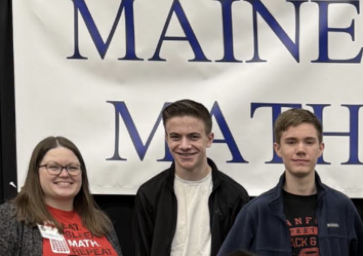 On April 7, roughly 1,000 students from approximately 100 schools across Maine will file into the Augusta Civic Center, sit down in near silence, and race to solve some of the most challenging math problems they've seen all year. Sanford High School's Math Team will be among them, and they're ready. The team practices every Tuesday after school under the guidance of Kailee Colbeth and Adam Soule. Those sessions are built around doing practice problems that closely resemble what students will actually see at meets. SHS junior captains Nathan Maloney and Hannah Labbe say the consistency of this year's group has made a real difference. "We've had a lot of the same people showing up, so you can really start to get into a groove and have better team rounds," said Maloney. "We've definitely seen a lot more success this year." Labbe agreed, adding that the experience has been personally rewarding as well. "It's really been fulfilling to succeed in all of the meets," she said. "I feel like I've learned a lot and I'm just going to carry it forward." That success has shown up throughout the regular season. The team has competed in five meets leading up to states, and Colbeth says the squad has grown stronger as the year has gone on. At a typical meet, students compete in five separate rounds, each focused on a specific math topic like trigonometry or statistics. Each round gives students 12 minutes to answer three questions. There's also a round where the whole team works together. Individual and team scores are added up, though only the top performers count toward the final tally. The state meet adds one more challenge that the team has been practicing: a relay round. Five students sit in a row, each with their own math problem to solve. The catch is that each person's answer gets passed to the next teammate, whose problem depends on getting that answer right. "It's something we don't do in normal meets," said Colbeth, "so we've really been focused on it these last few weeks, figuring out who is going to be best in each seat." It's a format that rewards both individual skill and trust in your teammates, and one that has the team thinking carefully about how they line up heading into the state competition. Both Labbe and Maloney competed at last year's state meet and say knowing what to expect will make a big difference. "The first time you go there, it can be kind of stressful, since it's a big auditorium with a lot of people," said Maloney. "But I think this year will be a lot easier." Labbe, put it simply: "I was going into it really blind. I learned so much. I feel like I'm able to take more out of it this year." Coach Colbeth said that the math team is open to all students. Practices resume on Tuesdays next school year. Students interested in joining are encouraged to stop by and see her.