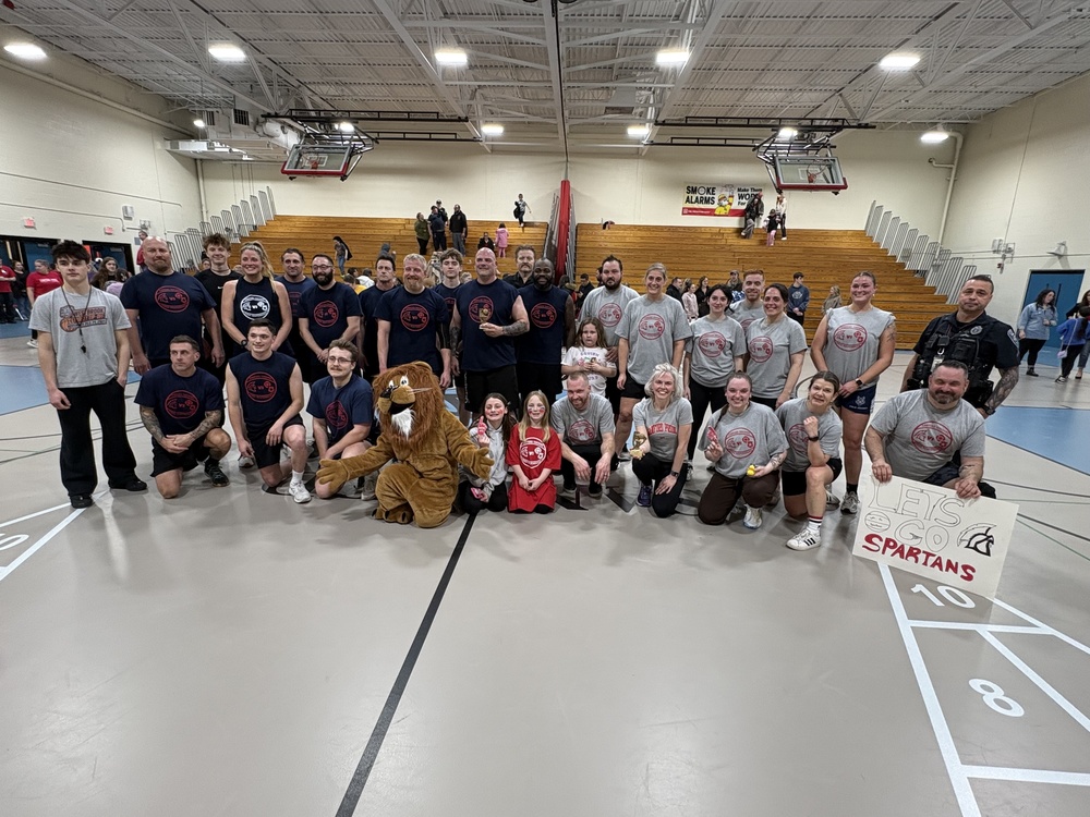 The Sanford Pride Elementary gymnasium was once again filled with excitement and community spirit on Thursday, March 12, as teachers and staff faced off against local first responders in a charity basketball game uniting all three elementary schools in the district. The third annual Staff vs. First Responders basketball game drew a large, loud, and fully engaged crowd of students, parents, and community members who packed the bleachers to cheer on both teams. Adding a special touch to the evening, members of Carl J. Lamb Elementary's show choir performed the national anthem prior to tip-off, setting the tone for the night ahead. "As a teacher who had the opportunity to play in this game, it was incredible to see our entire community come together in support of such a great cause," said Sanford Pride Fourth Grade Teacher Dan Fernandez. "Thank you to the Sanford Maine Police Department and all of the other first responders who took the time to come out and play alongside the teachers and other staff. Your participation helped make the event truly special for everyone involved. Looking forward to next year." The game featured teachers and staff members from across Sanford's elementary schools competing against a team of local police officers, firefighters, and other emergency personnel. Carl J. Lamb’s show choir came back out onto the court again for a special performance during halftime. While the first responders ultimately took home the first-place trophy, the real win was the incredible school spirit in the stands. Sanford Police Chief Eric Small spoke to the spirit of the evening: "This event is a great community tradition that our officers look forward to each year. It's always great to see our teachers and first responders come together under one roof for a night of fun and community spirit." "The crowd was large, loud, and fully engaged, which made for a great atmosphere," Chief Small added. "Sanford really does know how to come together for a good time. On behalf of the Police Department, thank you to everyone who played and to all who came out to support the game. We appreciate our community showing up to cheer on the players." Funds raised during the event will support PTA initiatives across all three elementary schools, directly benefiting students through additional resources, activities, and educational opportunities throughout the year.