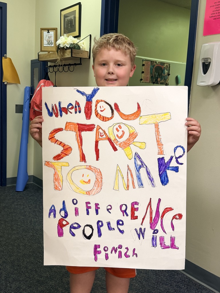 CJL's 4th Grader Phineas Wright says, "We can make a difference by sharing a smile."  Check out his poster he made that now adorns our halls. 