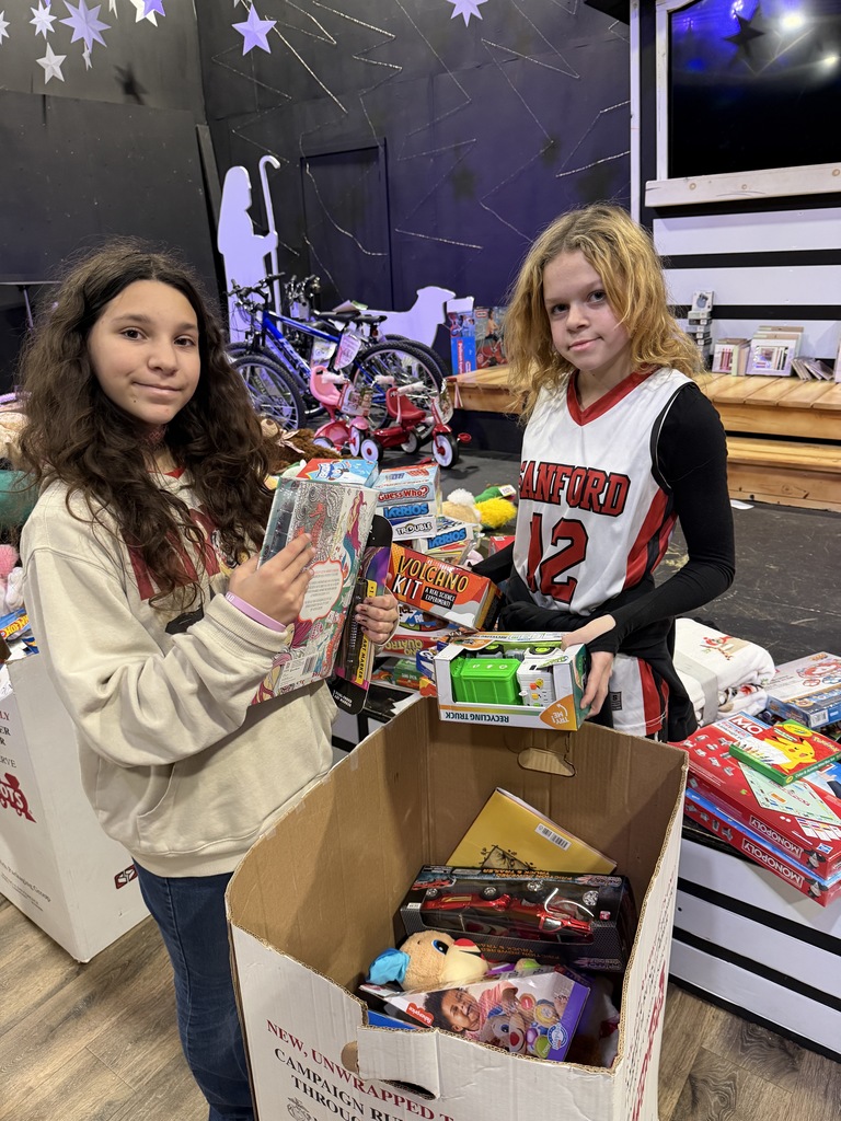 We're so proud of our Sanford Middle School and Sanford High School JMG students who volunteered with Toys for Tots on December 11th and 12th! On December 11th, our 7th graders teamed up with high school students to load in, count, and sort thousands of toys, getting everything organized for distribution. On December 12th, our 8th graders helped families shop for toys, making the experience welcoming and special for everyone involved. This annual volunteer effort is always a wonderful opportunity for our students to serve their community and gain perspective on the needs of their neighbors during the holiday season. Thank you to all our JMG students for your hard work