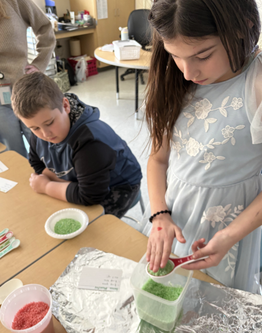 3rd and 4th graders are mastering fractions through hands-on learning! Students represented whole numbers as fractions, identified fractions greater than one, and explored equivalent fractions using multiplication. This week, they brought math to life by measuring ingredients for fun recipes like Island Punch, Watermelon Munch, and Green Monster using colorful rice to visualize fractional amounts. Learning + doing = understanding!