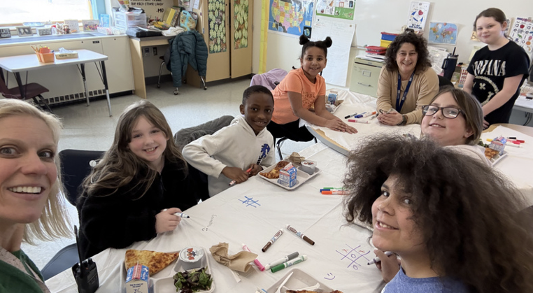 Mrs. Hally's Title literacy students had a reading challenge this March for a chance to earn lunch with Mrs. Hallissey and Ms. McGuckin, and they absolutely crushed it. First and second graders set out to read 100 books this month. First grade finished with 121 books and second grade came in at 124. Way to go, readers! Third and fourth graders had a different challenge: read for 20 minutes a day, 50 times total throughout March. Third grade hit 64 sessions and fourth grade came in at 62. Both grades blew past their goals! To celebrate, students got to enjoy lunch together and play games while sharing their favorite books.