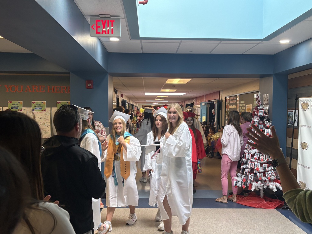 This morning, the Sanford High School Class of 2026 put on their caps and gowns and hit the road for their annual Senior Walk through our schools! Our graduates stopped by Sanford Middle School, Sanford Pride Elementary, St. Thomas School, Carl J. Lamb Elementary, and Margaret Chase Smith Elementary before making their way back to Sanford High School. Current students packed the hallways to cheer them on, and there were plenty of smiles and hugs with former teachers along the way. Congratulations, Class of 2026. Graduation is tomorrow! 🎓