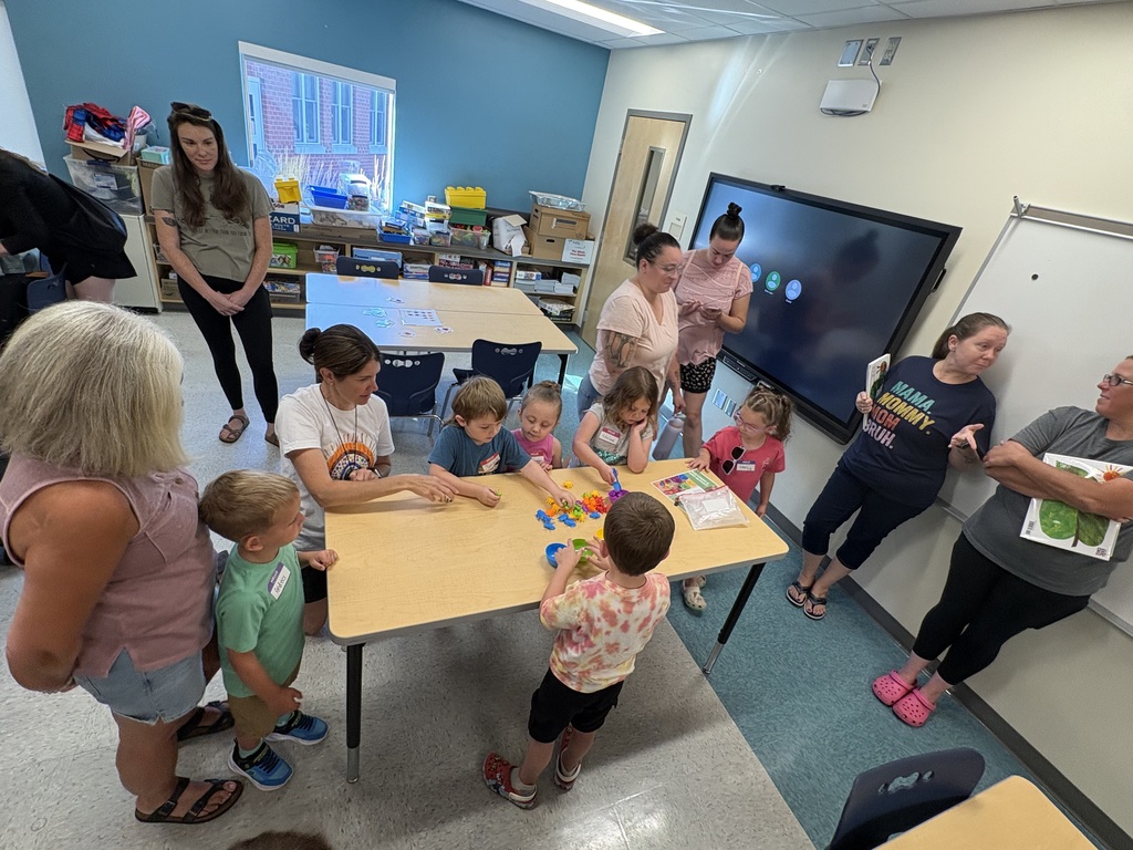 Children playing in classroom.