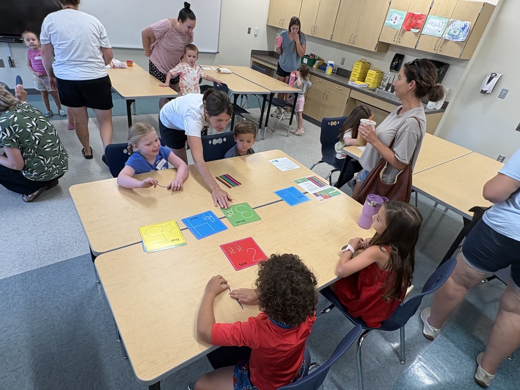Children playing in classroom.