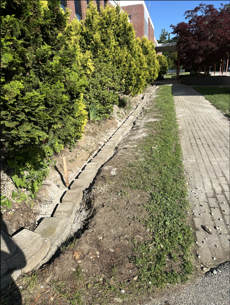 The retaining wall.