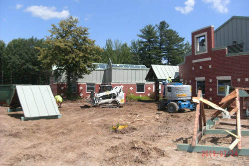 Main entrance canopy coming down.