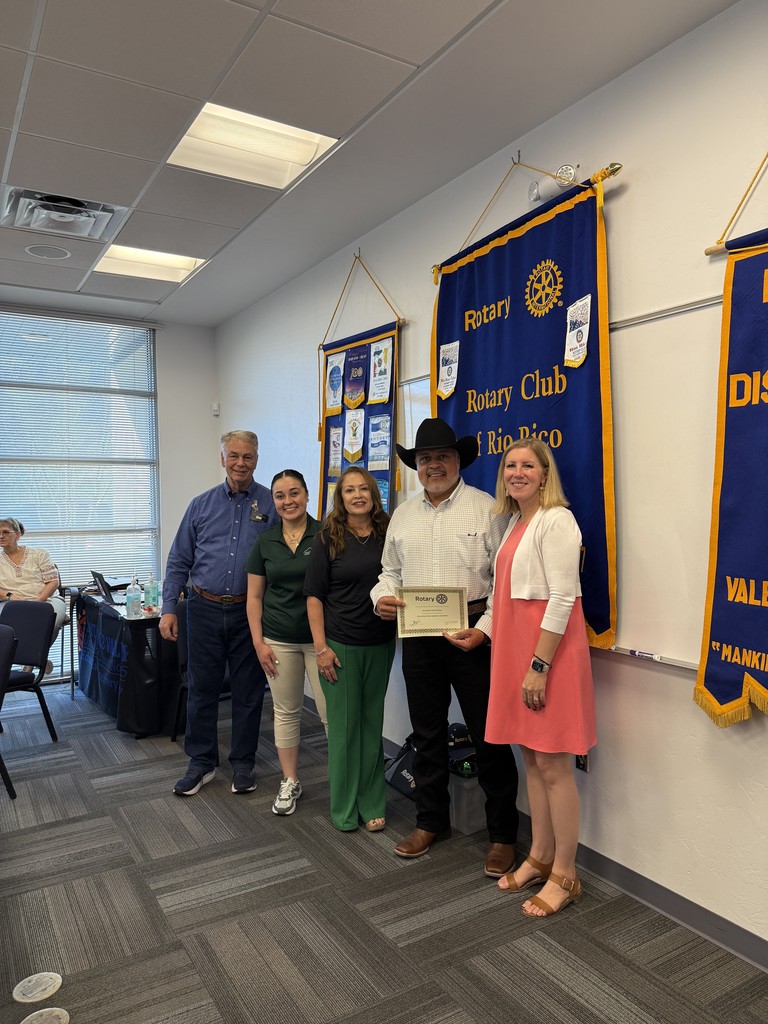 CtMS Principal Rebekah Cabrera and Rio Rico Rotary President Jim Wickstead with staff of the month