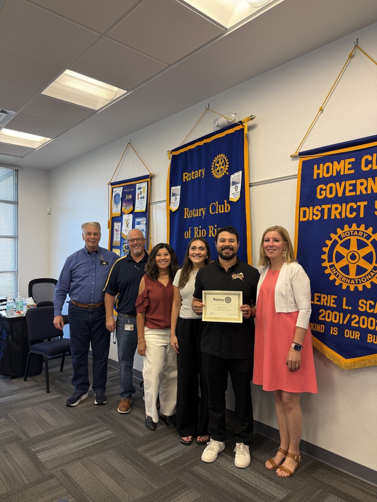 CtMS Principal Rebekah Cabrera and Rio Rico Rotary President Jim Wickstead with staff of the month