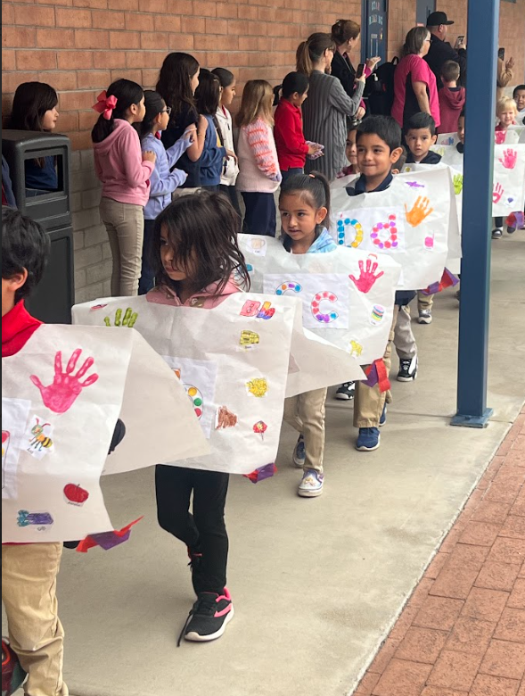 Kinder students walking in the ABC parade.