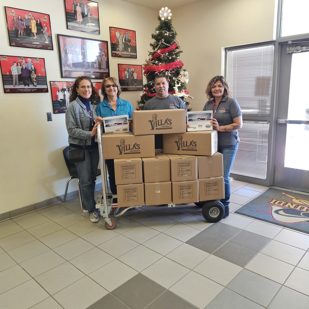 CtMS staff accepts food boxes