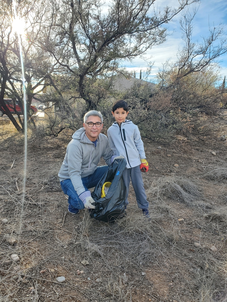 Parent and Student during trail clean up.