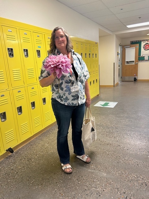 Ms. Markham walking the halls with a beautiful gift!