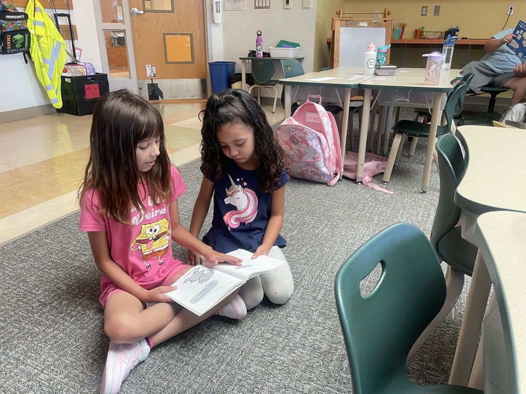 students reading together
