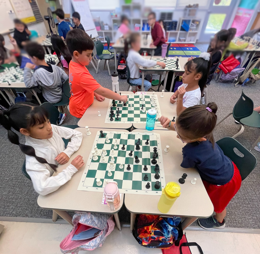 students palying chess