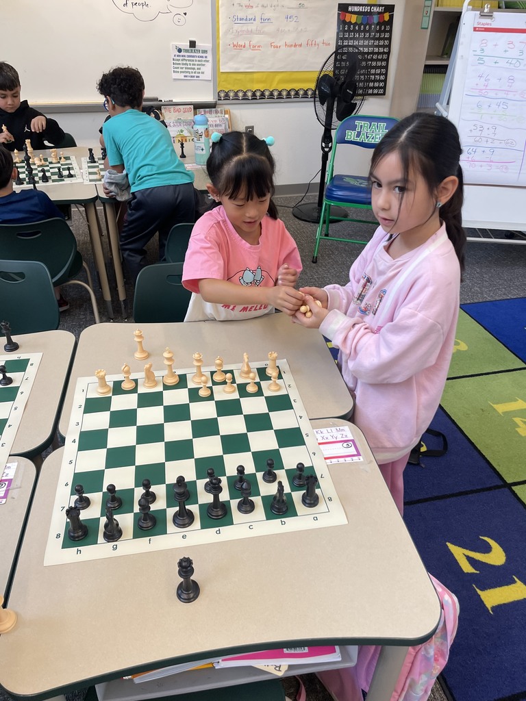 students palying chess