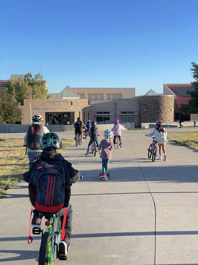 kids riding bikes to school